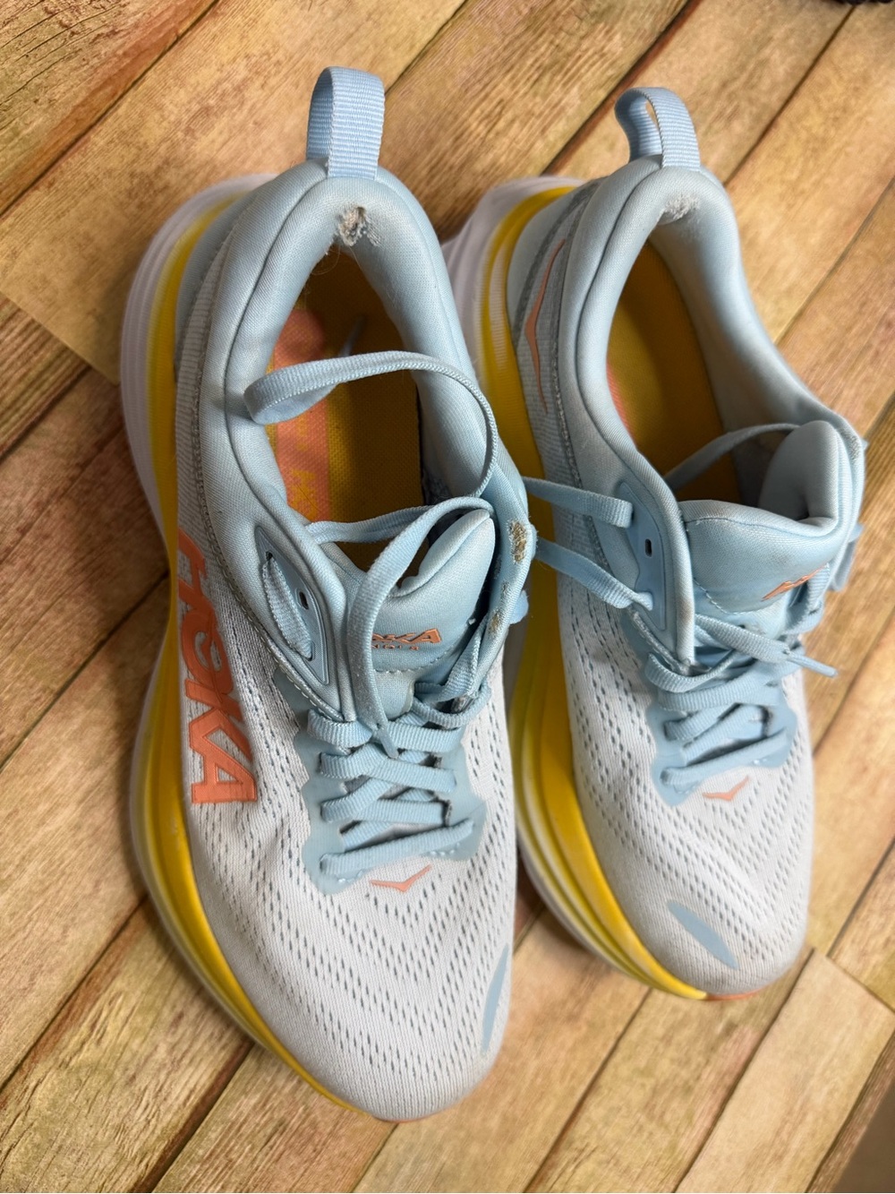 Hoka One One Women's Pale Blue Running Shoes with Yellow and Coral Accents